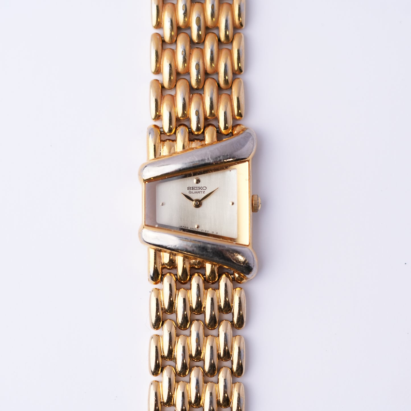 Seiko Asymmetrical Rivoli Gold Dial Watch