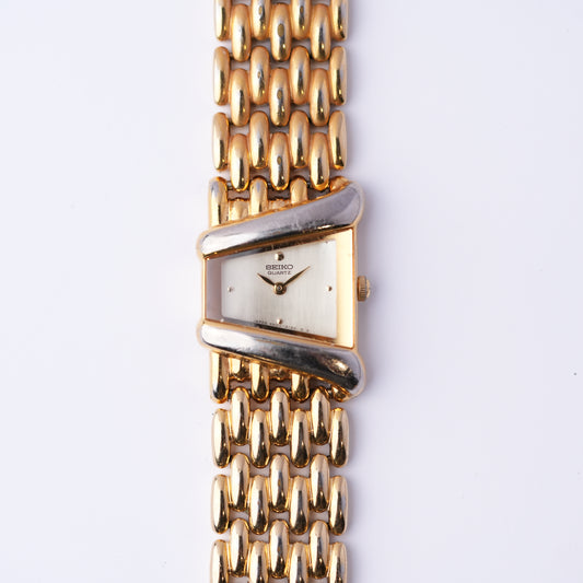 Seiko Asymmetrical Rivoli Gold Dial Watch