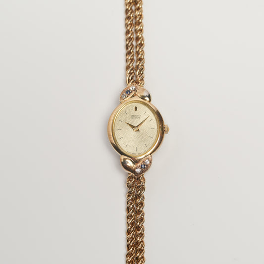 Seiko 2E20-5320 Sapphire Accent Watch