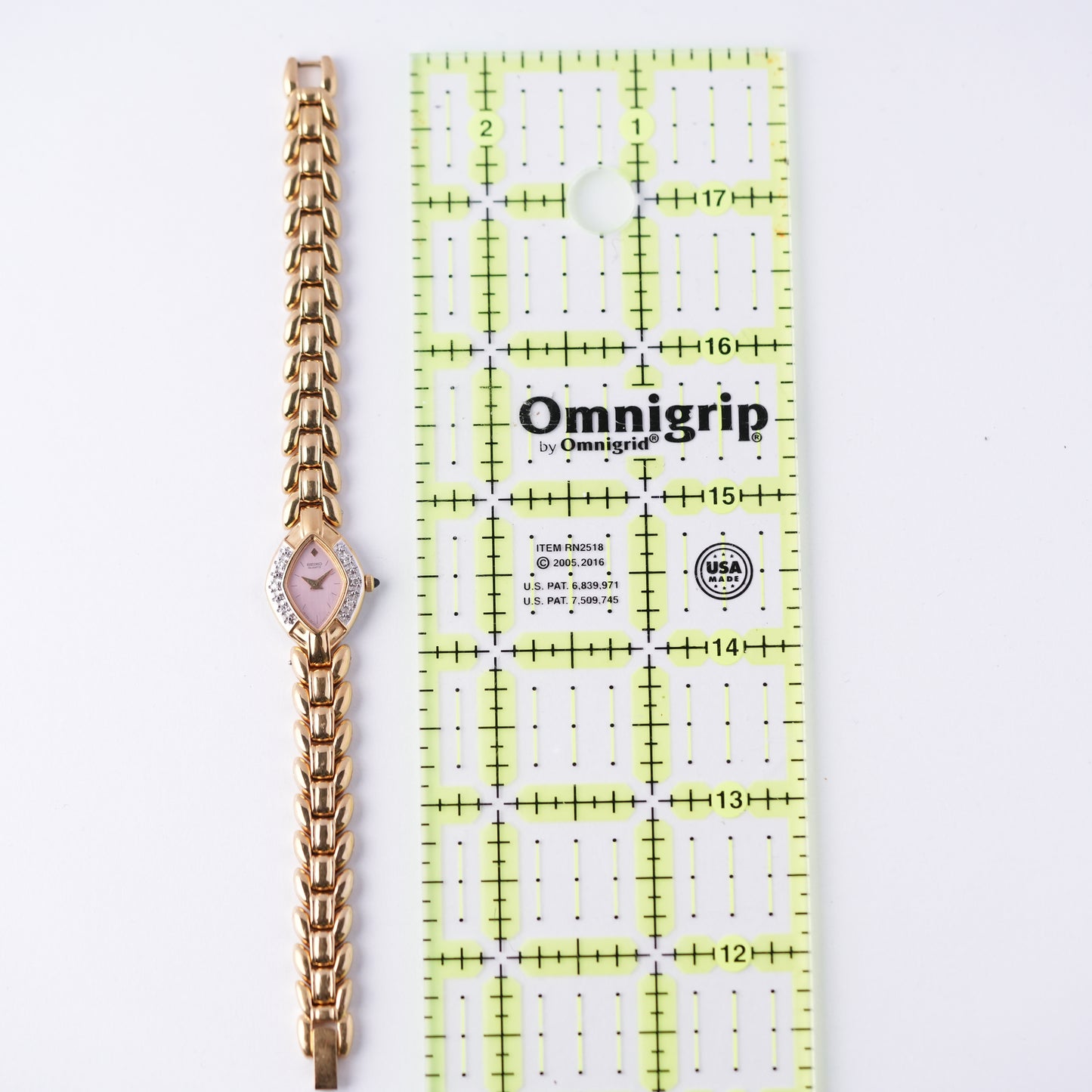 Seiko Pink MOP Dial Gold Bracelet Watch 2E20-7089